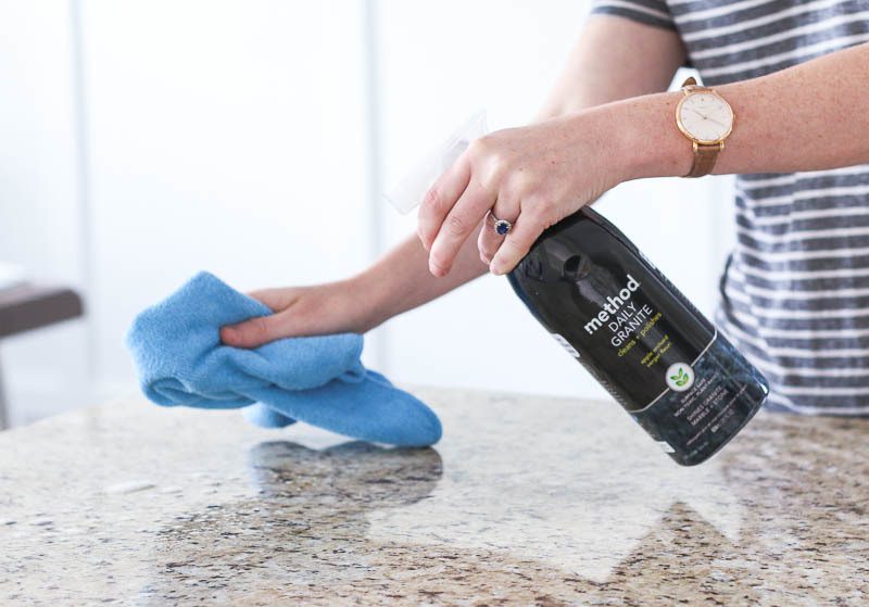 cleaning counters wiping
